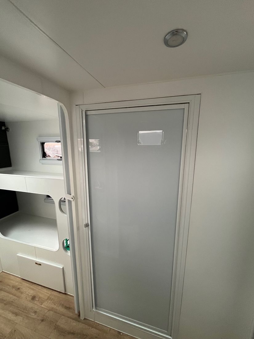 showerdoorwhite Caravan Shower Door - Opal infill - Image 1